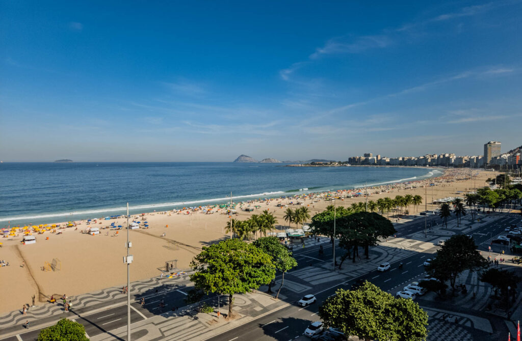 Panoramic beach and ocean view from a suite at Belmond Copacabana Palace, a top luxury hotel in Rio de Janeiro ©Stephanie Dosch | theViatrix Luxury Travel