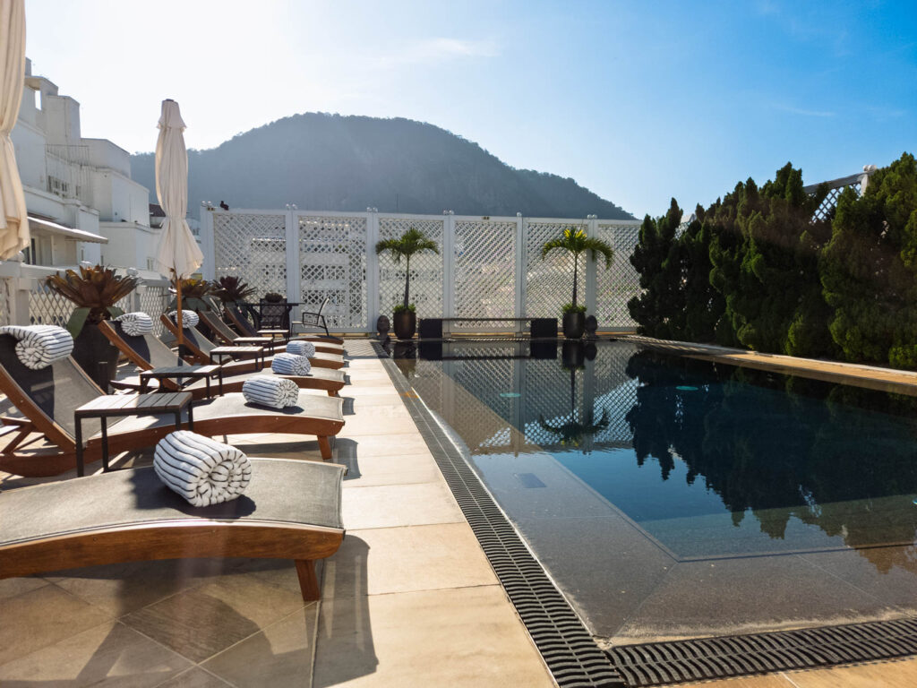 Rooftop pool with mountain views and sun loungers on the suite floor at Belmond Copacabana Palace, a Rio de Janeiro luxury hotel ©Stephanie Dosch | theViatrix Luxury Travel