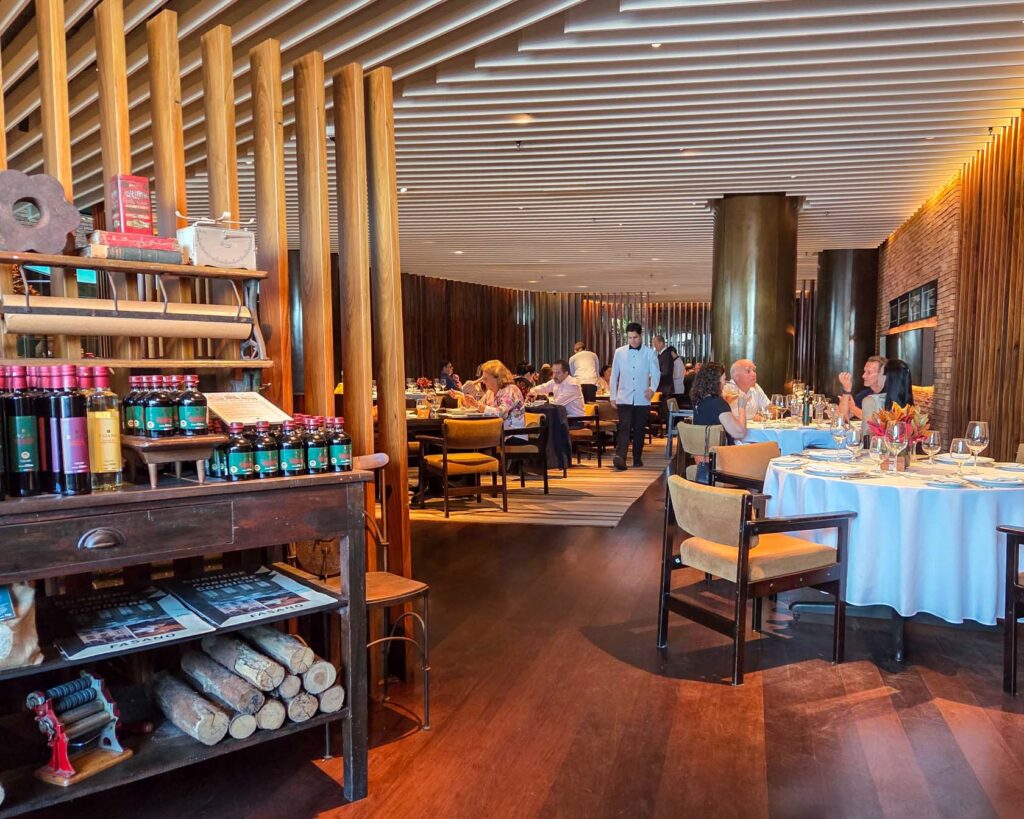 Warm-toned dining room with artisanal goods display at Hotel Fasano, a luxury hotel in Rio de Janeiro ©Stephanie Dosch | theViatrix Luxury Travel